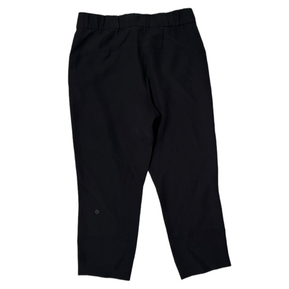 Lululemon On The Fly Crop Woven 23" Mid Rise Wrinkle Free Athleisure Black Sz 6 - Picture 8 of 12